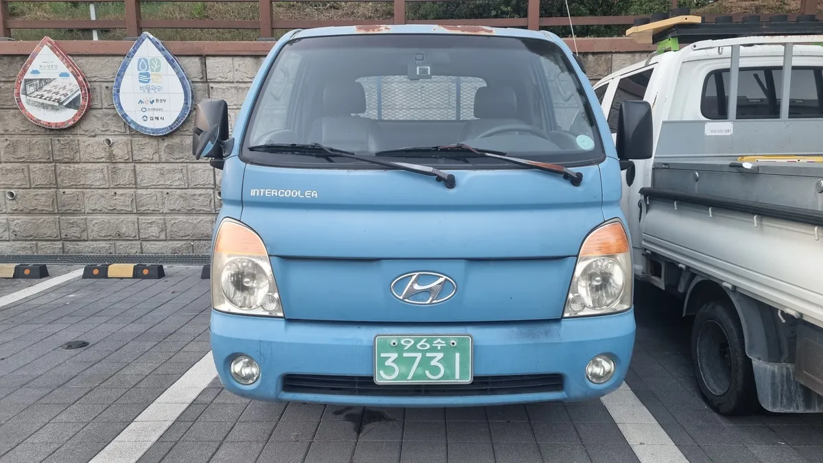 현대 중형화물 포터2 덤프트럭 2476cc 사진 1